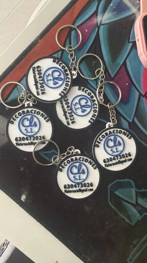 Llaveros promocionales para una empresa de decoración